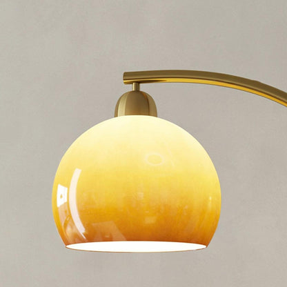 Modern Amber Dome and Curved Gold Metal Floor Lamp